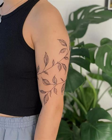 forearm vine tattoo